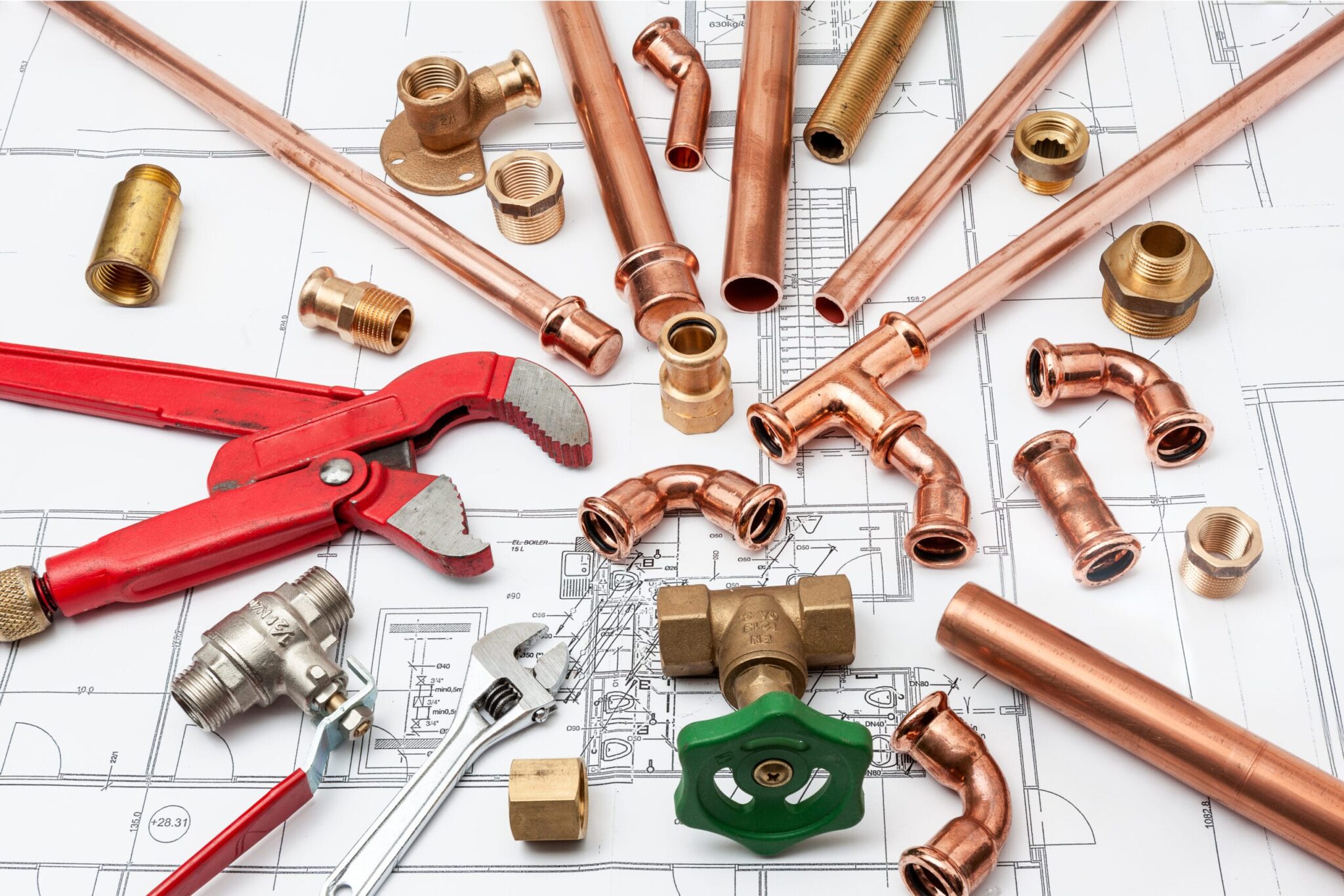 Copper pipes, fittings, valves, and plumbing tools in Erie